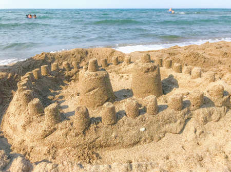 Sand castle on the beach. Sand castle on the beach. Sand castle on the beach.の写真素材