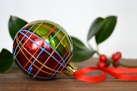 Colorful Christmas ball on wooden tableの写真素材