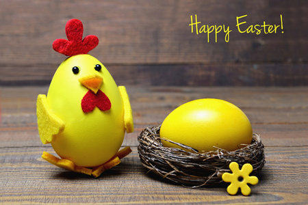 Happy Easter card: Easter chick and egg in the nestの写真素材