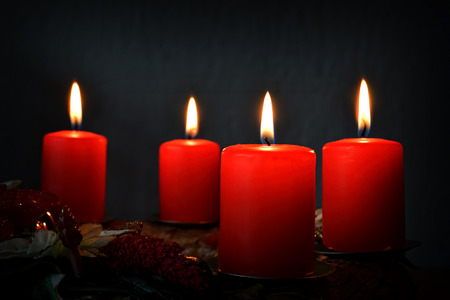 Four burning candles on advent wreathの写真素材
