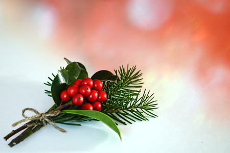 Christmas bouquet: Holly berries and fir branchesの写真素材