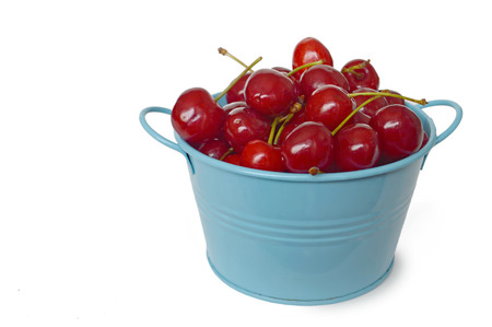 Sweet  cherries in the bucketの写真素材