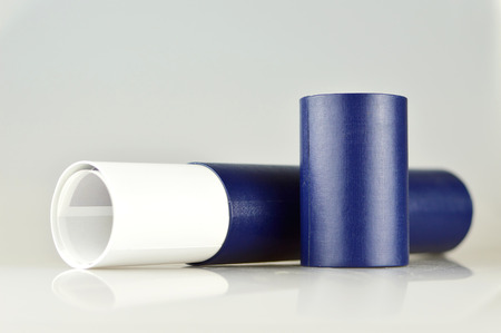 Graduation diploma scroll on light backgroundの写真素材