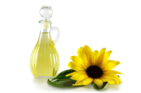 Sunflower oil in a decanter isolated on whiteの写真素材