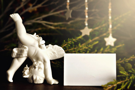 Angel figurine, Christmas stars and blank Christmas cardの写真素材