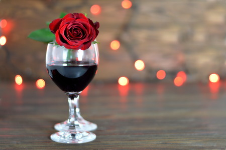 Valentines Day card with red rose and wineの写真素材