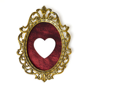 Valentines Day card with heart ornament and vintage picture frame isolated on white backgroundの写真素材