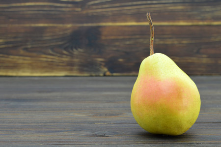 Pear on wooden backgroundの写真素材