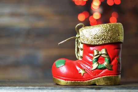 Christmas boot and blurred lights in backgroundの写真素材