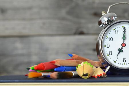 Back to school background with school supplies, clock and copy spaceの写真素材