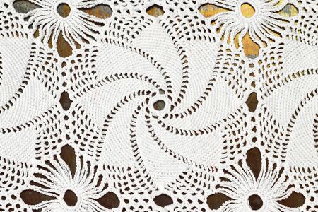 Close up of crocheted tablecloth