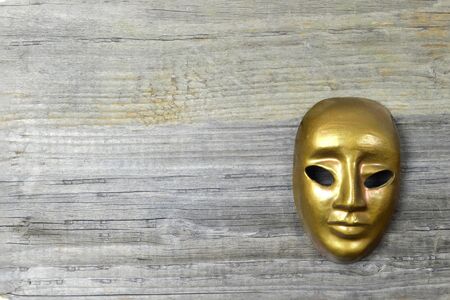 Venetian carnival masks on wooden backgroundの写真素材