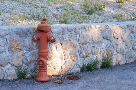 Old fire hydrant on the streetの写真素材