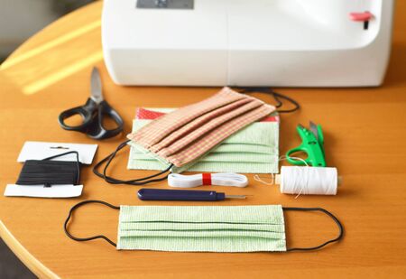 Sewing protective medical masks. Handmade medical face masksの写真素材