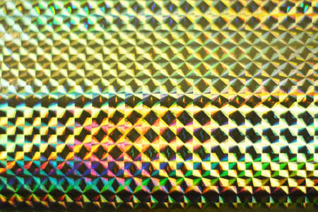Rainbow holographic foil pattern. Colorful hologram surfaceの写真素材