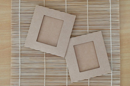 Two papers putting on the wood