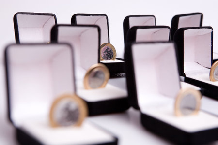 boxes of jewels with brazil real coin