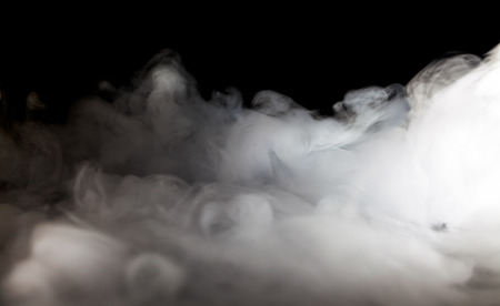 Abstract  fog or smoke move on black color backgroundの写真素材