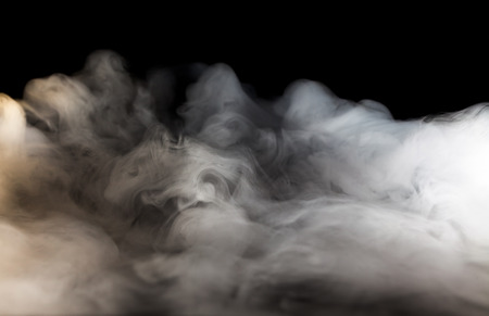 Abstract  fog or smoke move on black color backgroundの写真素材