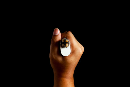 human hand holding rebuild able atomizer electronic cigarette. top view. black color background.の写真素材