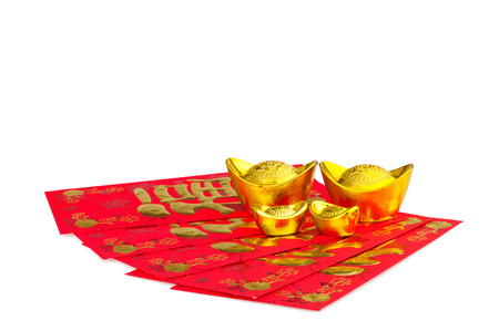 Chinese new year festival decorations, ang pow or red packet and gold ingots.の写真素材