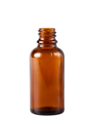 blank brown medicine glass bottle uncap isolated over whiteの写真素材