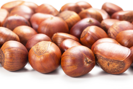 Group of grilled chestnuts. Isolate on white background. Autumn background.の写真素材
