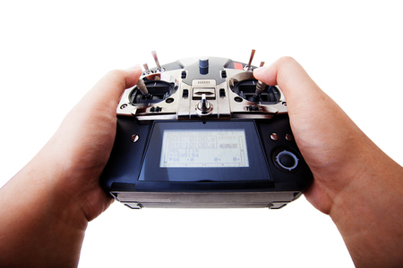 Remote control in hand man. In first person point of view isolated on white background with clipping pathの写真素材