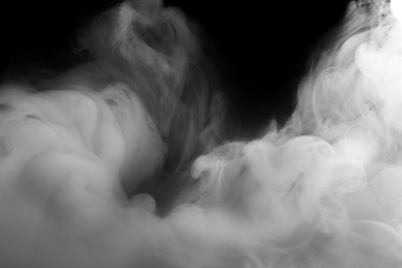 Abstract fog or smoke move on black color backgroundの写真素材