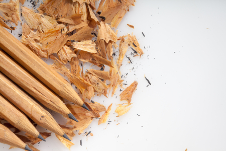 Pencil shavings on white background with copy space. selective focus.の写真素材
