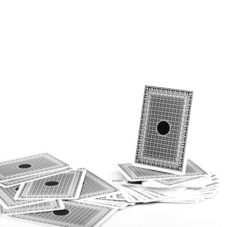 Back side of play card black color on isolated white backgroundの写真素材