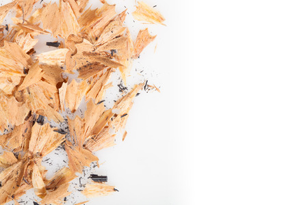 Pencil shavings on white background with copy space. selective focus.の写真素材