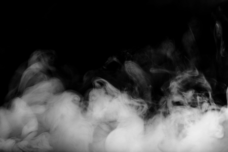 Abstract fog or smoke move on black color backgroundの写真素材