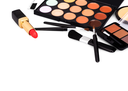 brush and makeup cosmetic products on isolated white backgroundの写真素材