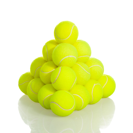 Pile of Tennis Balls sport equipment on white background with clipping pathの写真素材