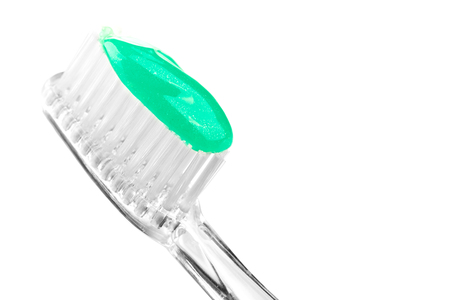 Toothbrush and toothpaste on isolated white background with clipping pathの写真素材