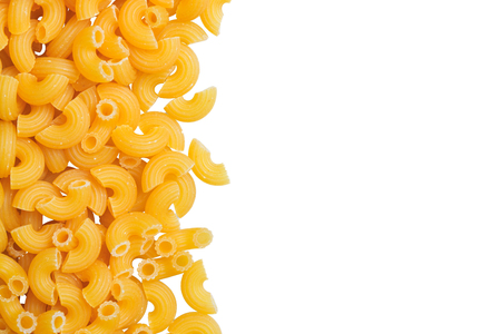 Macaroni angle pasta closeup with copy space and clipping path on white backgroundの写真素材