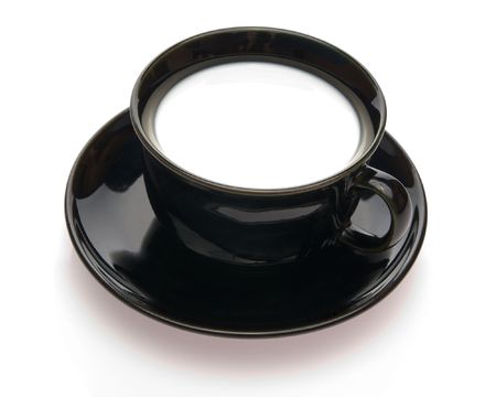 Black cup of milk isolatedの写真素材