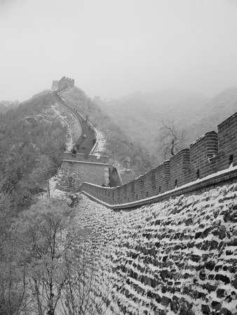 Great wall of China in the snow in the Jurongguan side Beijingの写真素材