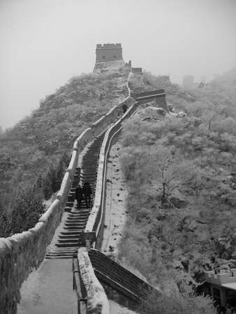 Great wall of China in the snow in the Jurongguan side Beijingの写真素材