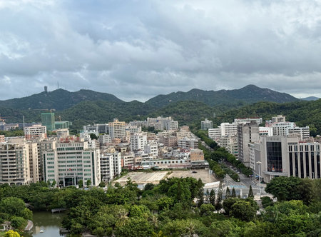 In the morning, the southern city of China is bathed in sunshine, with undulating mountains, dense...