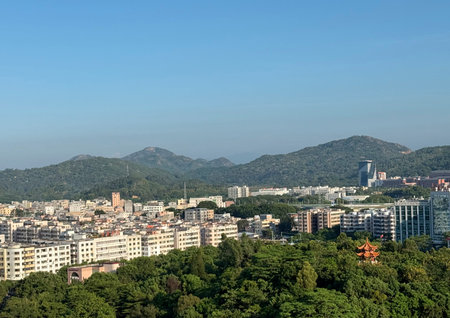 In the morning, the southern city is bathed in sunshine, with undulating mountains, dense forests,...