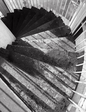 In the winter of 2025, an old spiral staircase made of steel plates at a viewing platform in a city in southern China.の写真素材