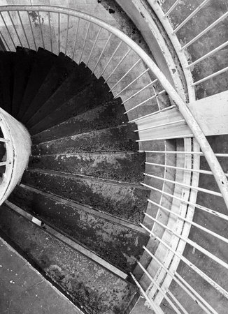 In the winter of 2025, an old spiral staircase made of steel plates at a viewing platform in a city in southern China.の写真素材