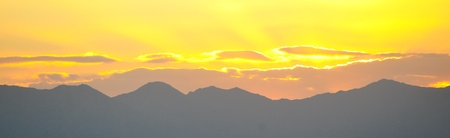 Sunset Over Mountainsの写真素材