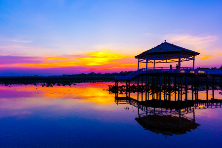 Sunset, Twilight at the reservoir with pavilion,Silhouette.(Bueng Si Fai Phichit.)の写真素材