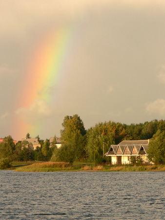 Rainbow over the lakeの写真素材