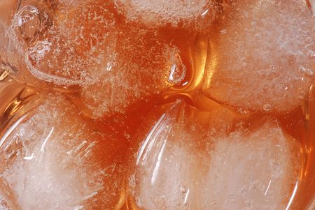 Whisky with ice in closeupの写真素材
