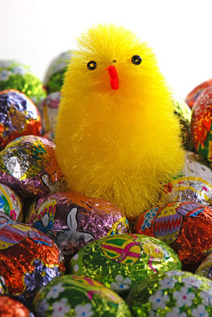 Chocolate Easter eggs and a toy chicken