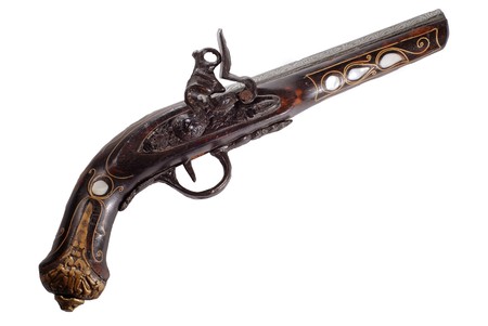 Old flintlock pistol isolated on white backgroundの写真素材